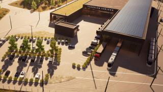 Havainnekuvassa varikkorakennus, jossa on kolme osaa.