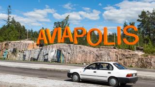 Auto ajaa Aviapolis-kyltin ohi.