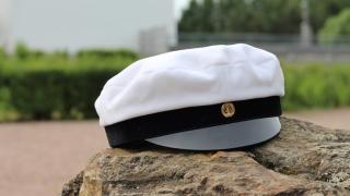 Student cap on a rock.