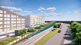 Havainnekuvassa katunäkymä, jonka keskellä on ratikkatunnelin puistokatto.